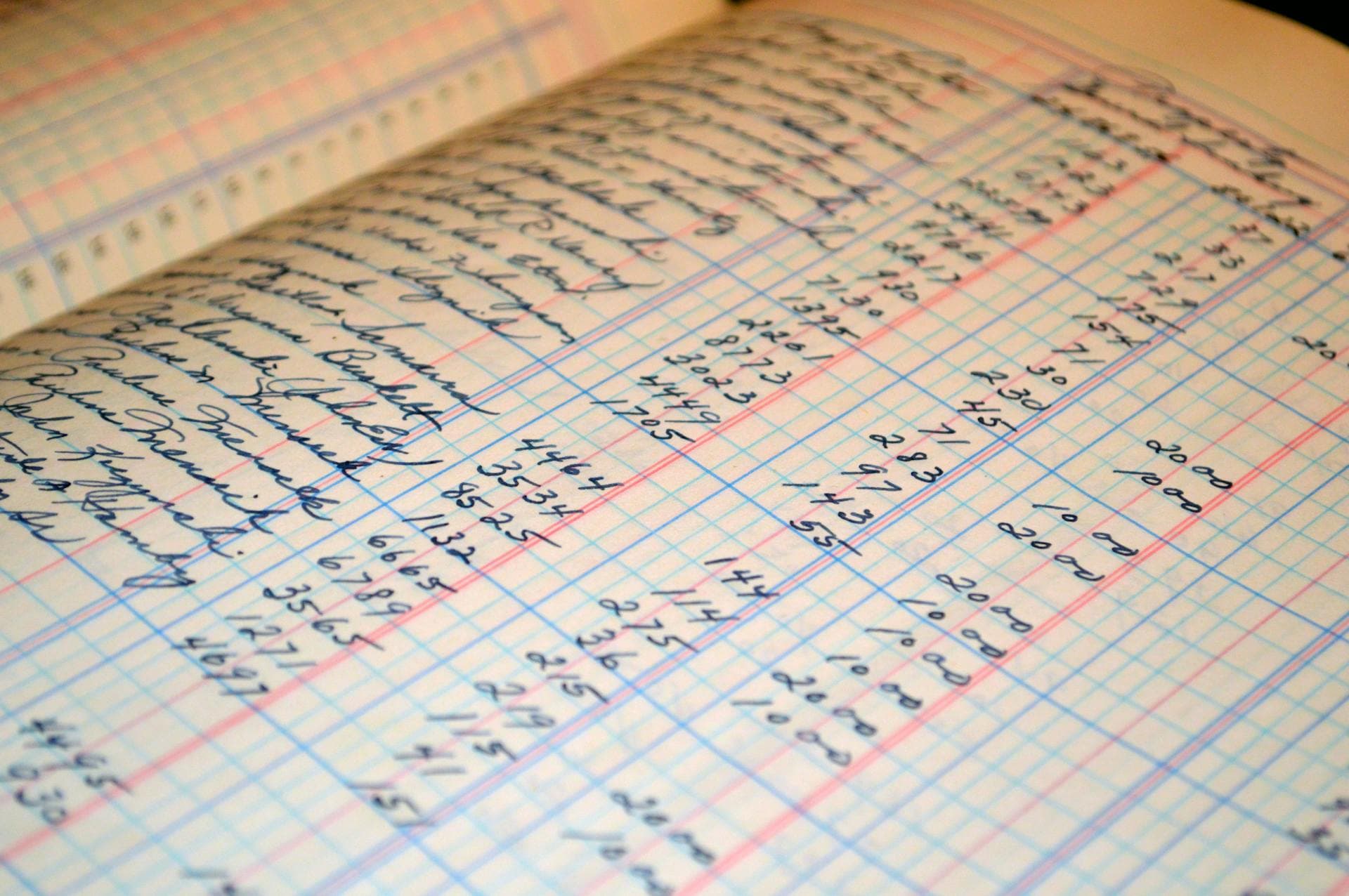 A vintage handwritten ledger filled with columns of financial figures — evoking the accounting framework that made owning servers add up for thirty years, and no longer does.
